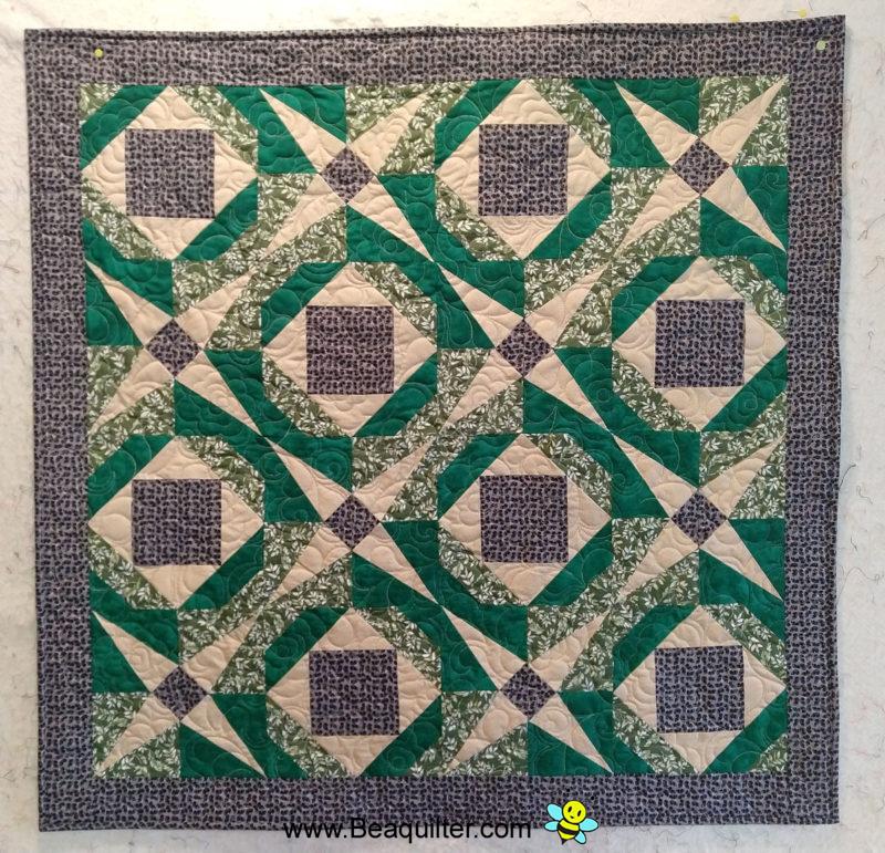 Crossed Canoe green quilt - Beaquilter